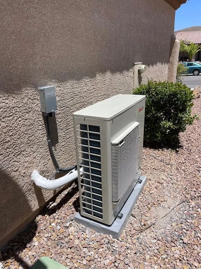 Residential air conditioning condenser unit in Long Lake